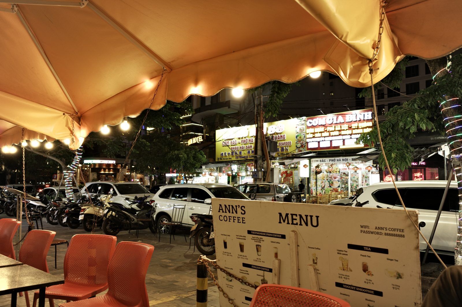 An Thuong street at night in Da Nang with cafe terraces and Vietnamese and Korean restaurant signs