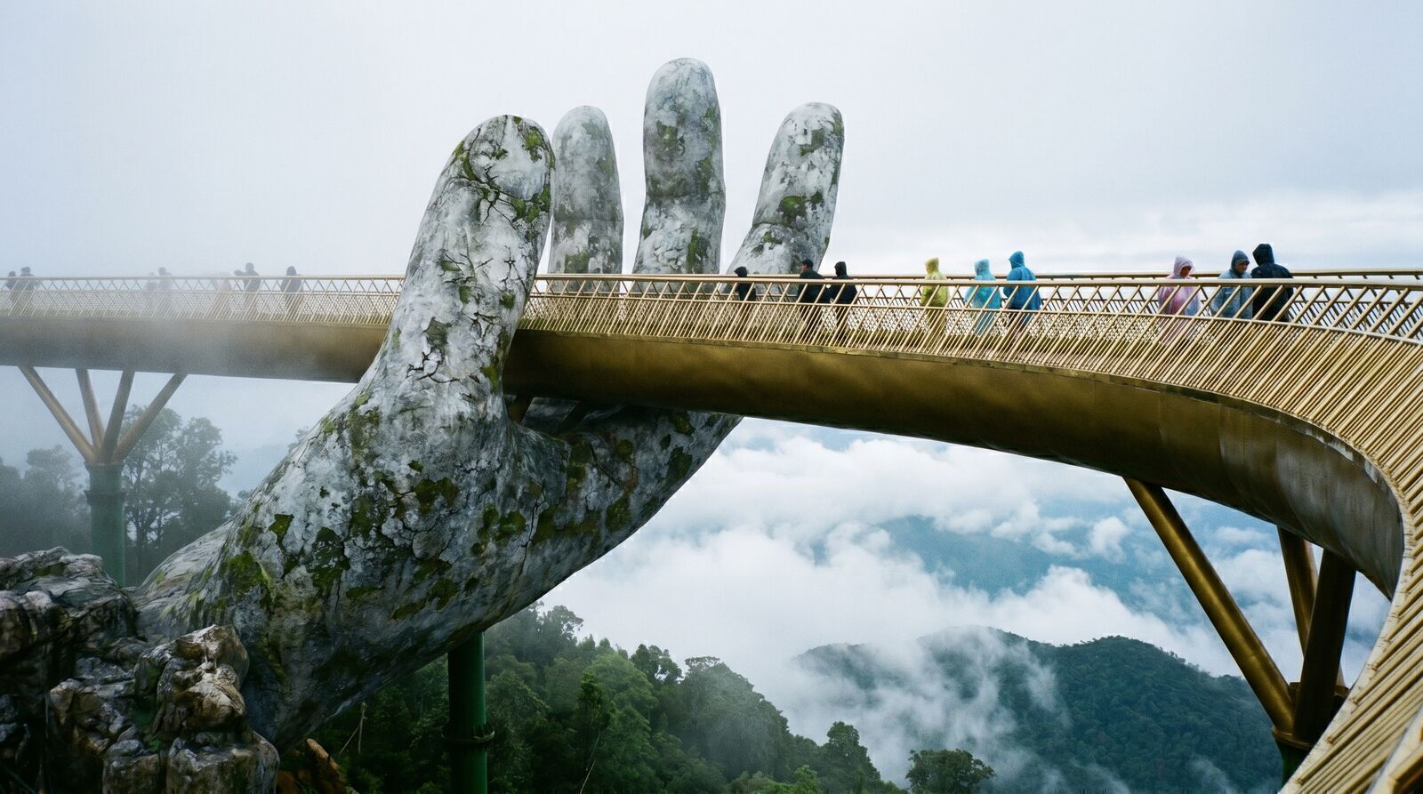Golden Bridge held by giant stone hands at Ba Na Hills near Da Nang