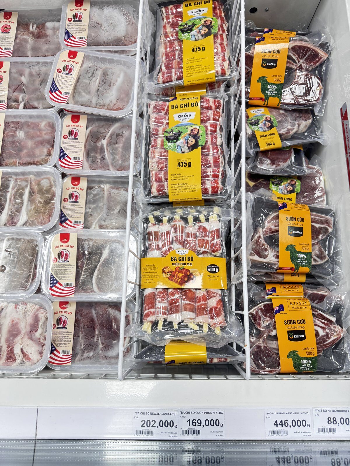 Imported beef and lamb packs in a Hanoi supermarket fridge with price tags of 202,000, 169,000 and 446,000 dong